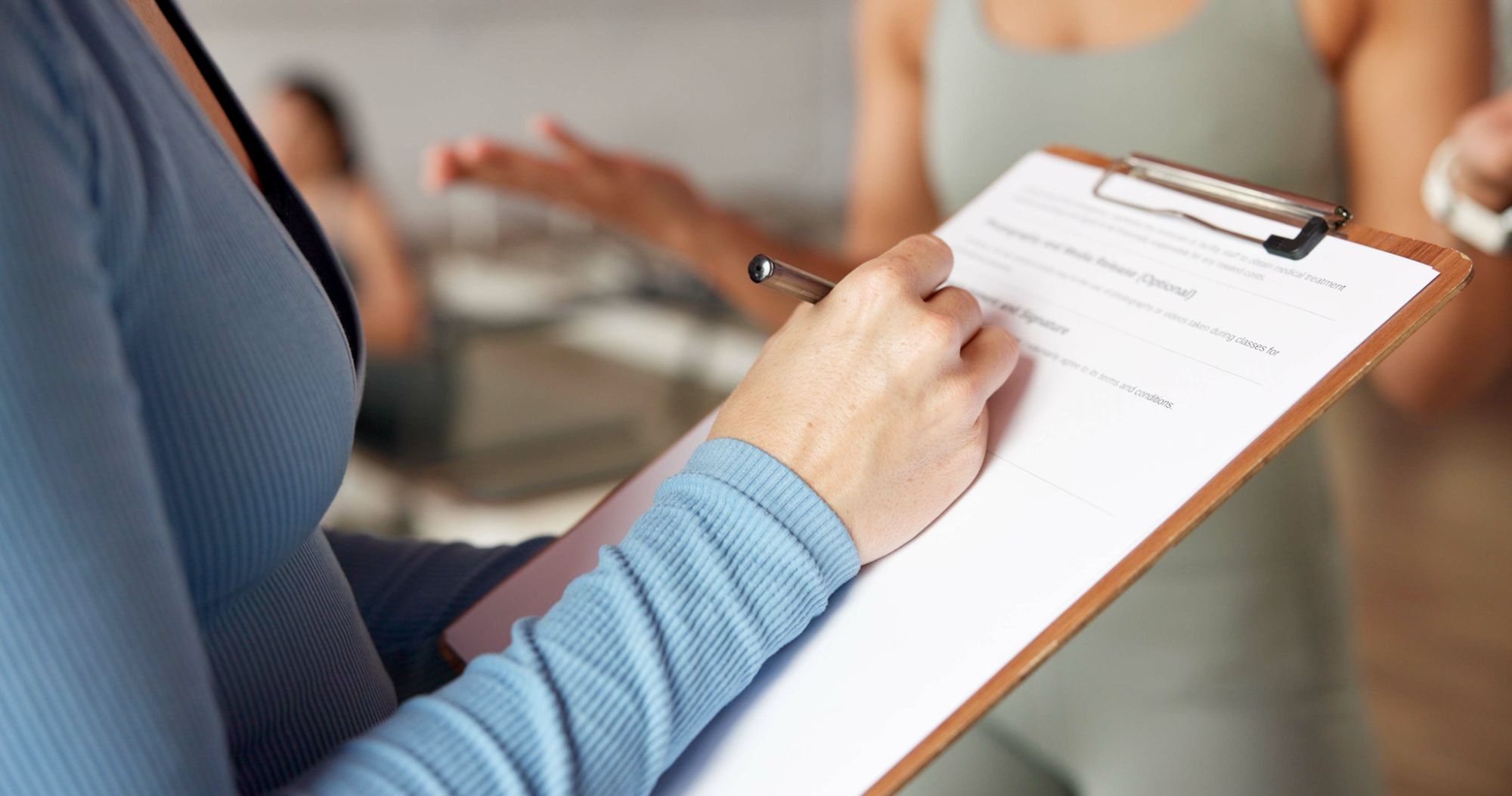 Person holding clipboard